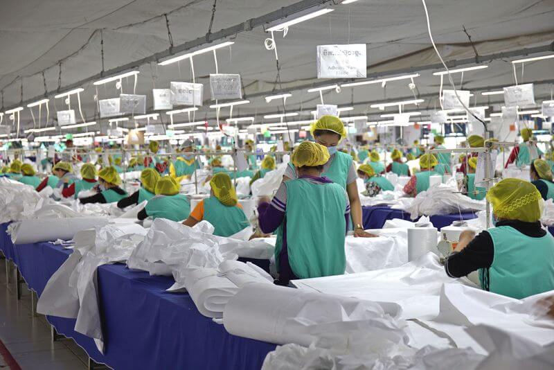 Workers inside Medtecs production facility in Cambodia.